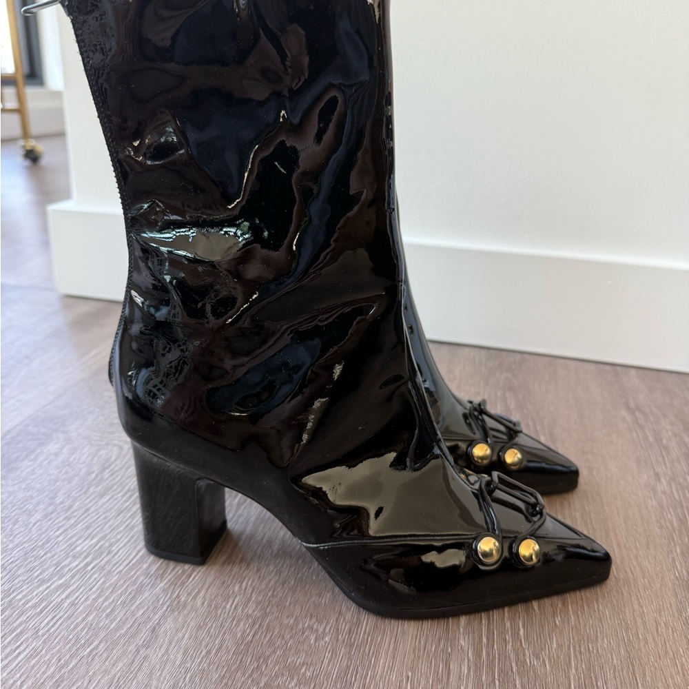 Chic Black Patent Leather Ankle Boots with Gold Accents